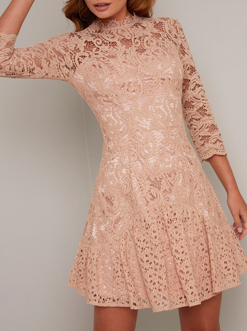 Lace Overlay Long Sleeved Dress In Rose Gold