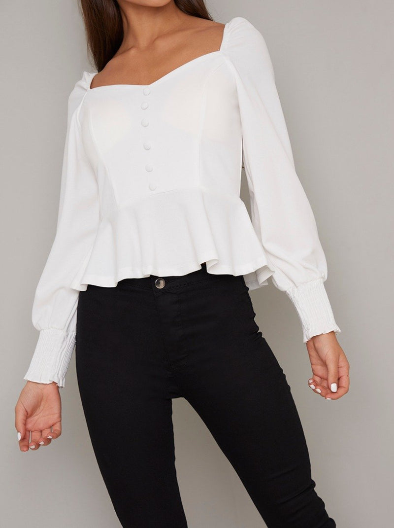 Puff Sleeved Button Peplum Top in White