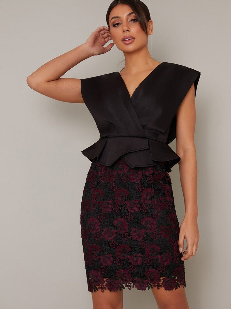 Wrap Style Bodice Peplum Lace Midi Dress in Black