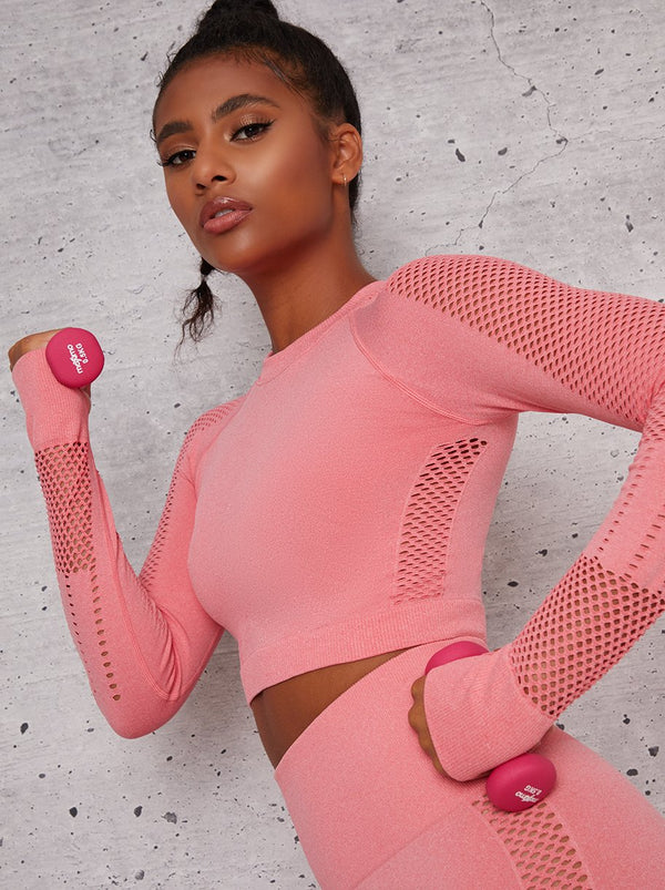 Long Sleeved Cropped Sports Top with Eyelet Design in Pink