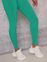 Sports Leggings with Body Contouring Design in Green