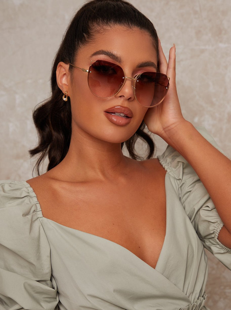 Oversized Rounded Cat Eye Sunglasses in Brown